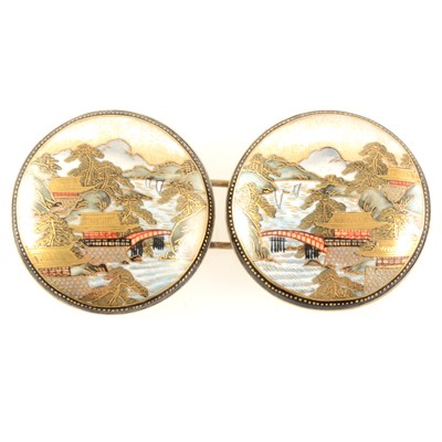 Lot 326 - A pair of Japanese satsuma buckles, depicting scenes of mountains.