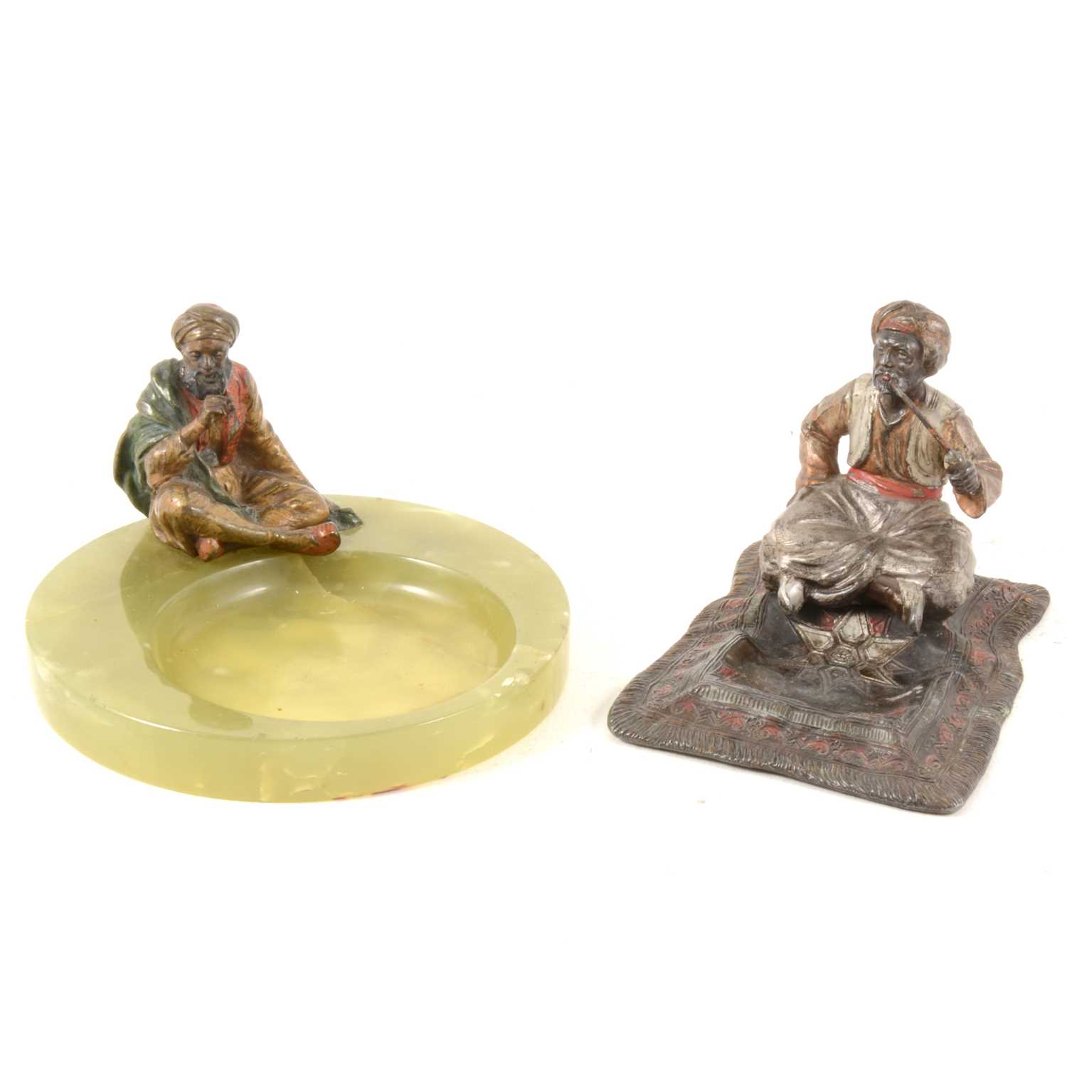 Lot 145 - A Bergman style cold painted bronze seated figure on green marble ashtray and lead based ashtray.