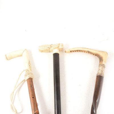 Lot 198 - Two bone handled walking sticks and another with stag's horn handle.