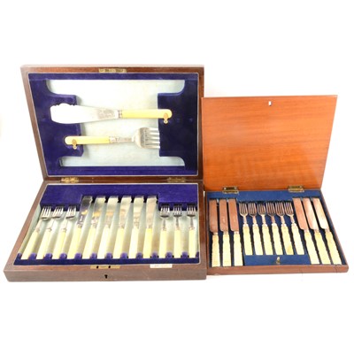 Lot 313 - Two cased simulated ivory and silver cutlery sets.