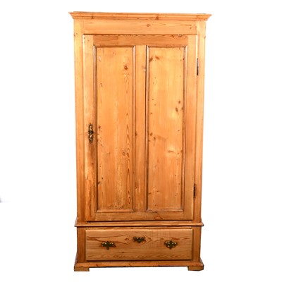 Lot 139 - A stripped pine armoire