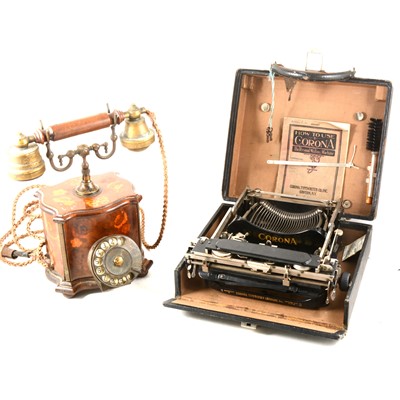 Lot 279 - A vintage mahogany inlaid telephone and a cased Corona folding typewriter.