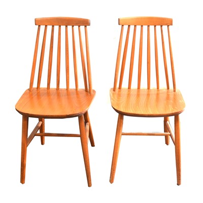 Lot 594 - A pair of vintage stained beech stick back kitchen chairs