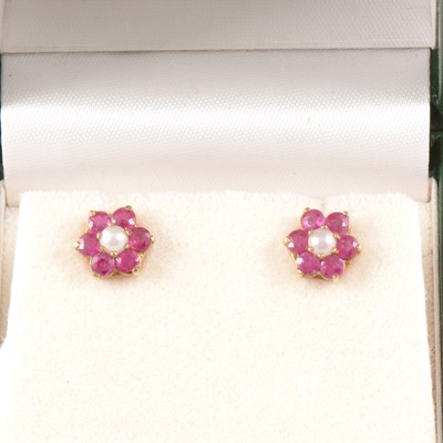 Lot 357 - A pair of ruby and pearl cluster ear studs.