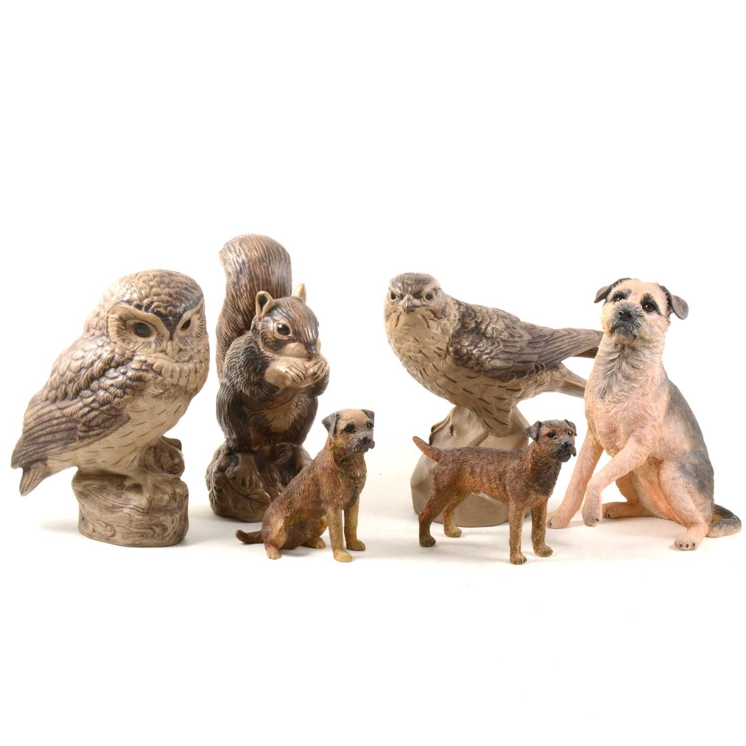 Lot 28 - Three Poole Pottery stoneware animals, two Border Fine Arts figures and one other.
