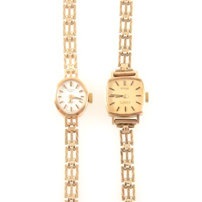 Lot 370 - Titus and Rotary - two lady's 9 carat yellow gold wrist watches.