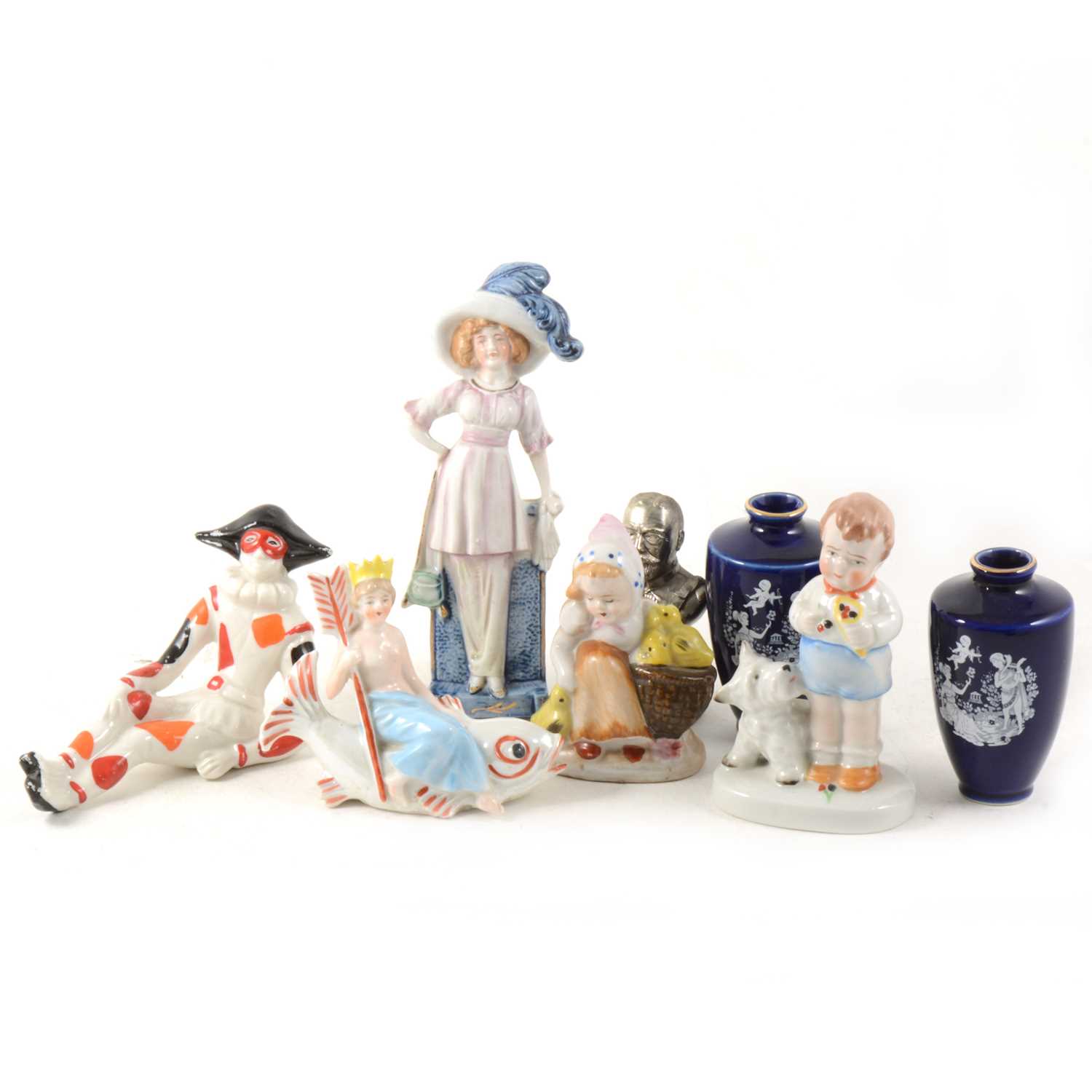 Lot 38 - A box of decorative ceramics including lustred nursery fairings