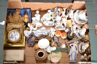 Lot 38 - A box of decorative ceramics including lustred nursery fairings