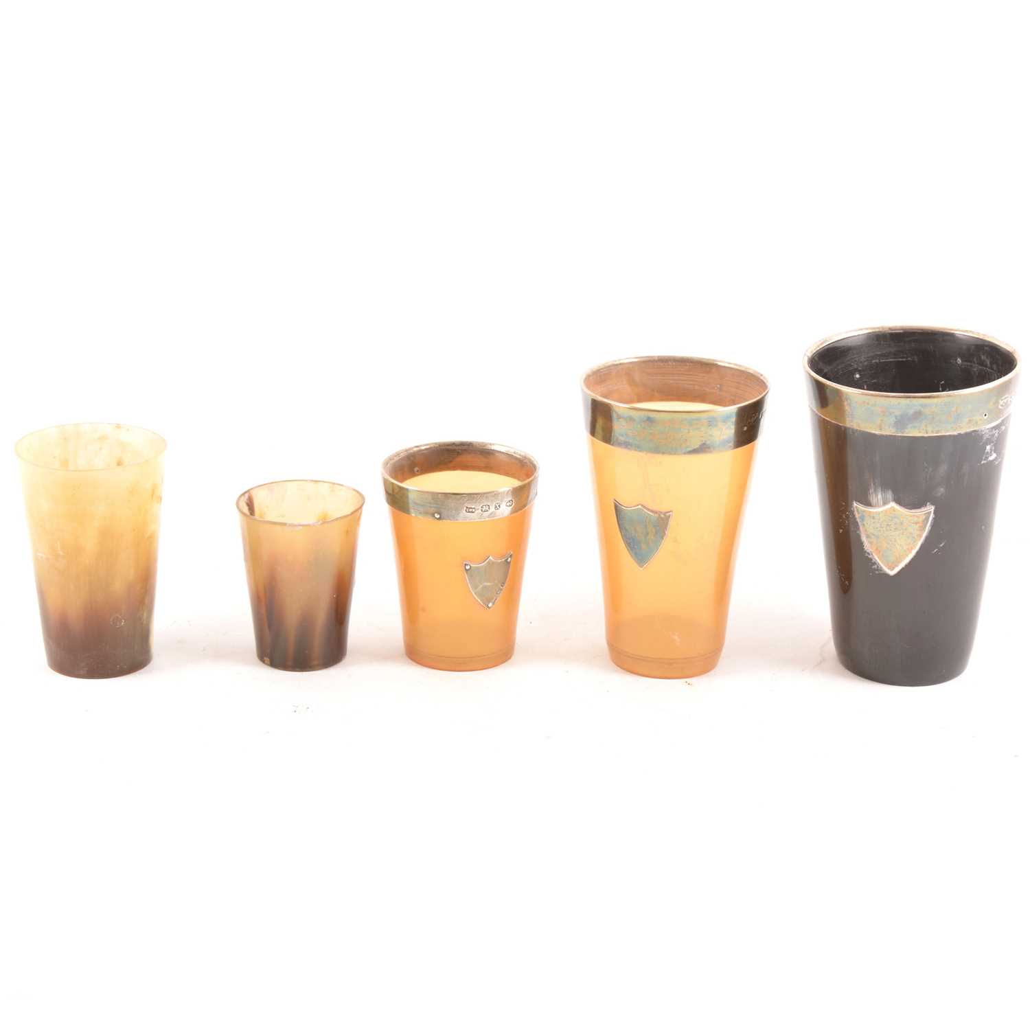 Lot 146 - Five horn beakers, three with silver mounts