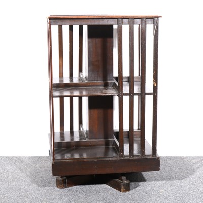 Lot 483 - An Edwardian stained oak revolving bookcase