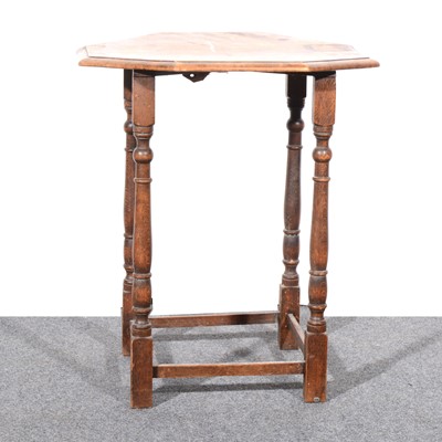 Lot 119 - An oak occasional table with chrome gallery, and a mahogany occasional table