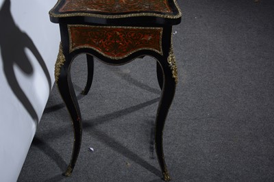 Lot 100 - A Victorian ebonised and boule work dressing table