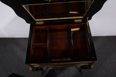 Lot 100 - A Victorian ebonised and boule work dressing table