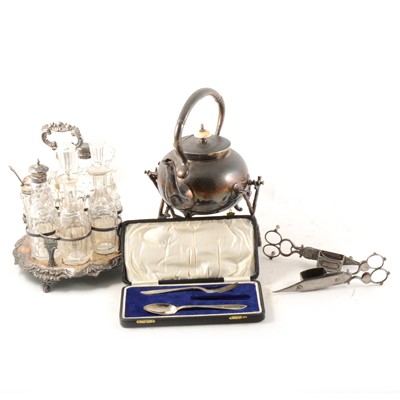 Lot 232 - A quantity of electroplated wares, to include a spirit kettle, seven piece cruet set, candle snuffers etc.