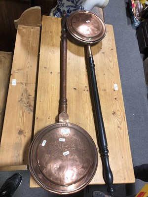 Lot 281 - Two Victorian copper warming pans, one with ebonised handle