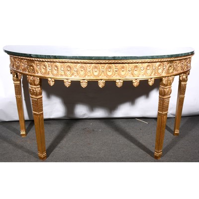 Lot 590 - A reproduction bowfront console table, inspired by William Kent