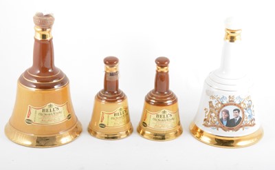 Lot 158 - Bells Scotch Whisky Commemorative decanters; a set of graduating set of Bell decanters, etc