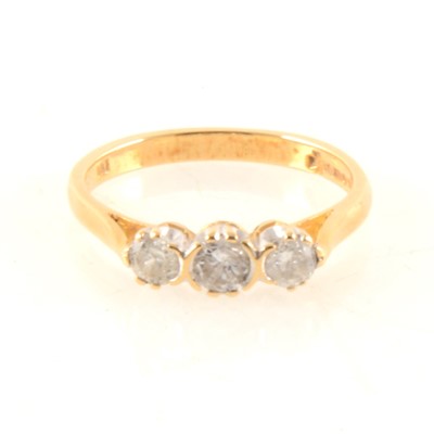 Lot 333A - A diamond three stone ring.