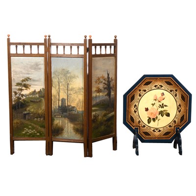 Lot 110 - A stained wood three-fold fire screen, painted panels of landscape scenes; and an octagonal screen