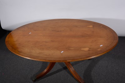 Lot 97 - A modern low oval yew top table