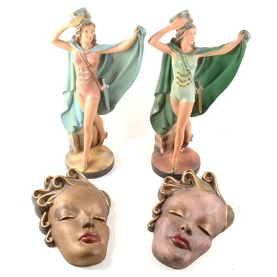 Lot 81 - A pair of plaster Tiller Girl figurines and five plaster "mask" wall plaques.