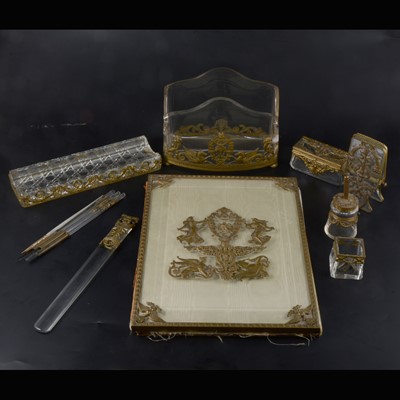 Lot 256 - Empire style gilt metal mounted glass desk set