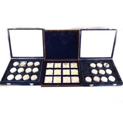 Lot 415 - Six cases of cupro nickel collectors coins in cases and The Copper Inlaid HMS Victory Coin Set".