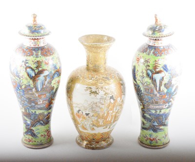 Lot 47A - A pair of Chinese covered vases