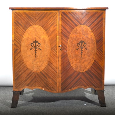 Lot 402 - A reproduction inlaid mahogany serpentine front cabinet