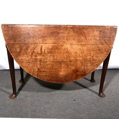 Lot 564 - An old oak gateleg dining table, oval top,...