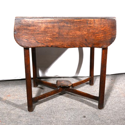 Lot 569 - A Georgian oak Pembroke table, D-shape leaves,...