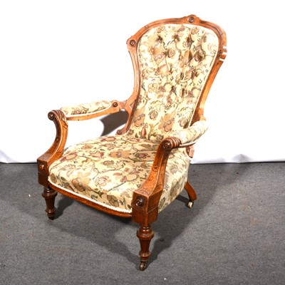 Lot 580 - A Victorian walnut spoon-back nursing chair