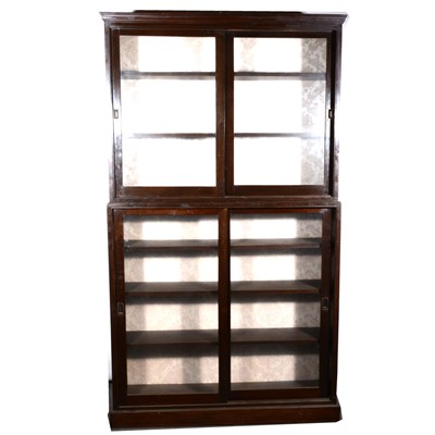 Lot 542 - A stained beechwood two-heights bookcase,...