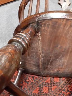 Lot 79 - An elm and ash Windsor chair
