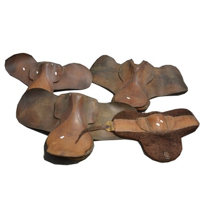 Lot 103 - Three old leather horse saddles and a felt pony pad.