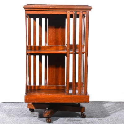 Lot 575 - Edwardian walnut revolving bookcase