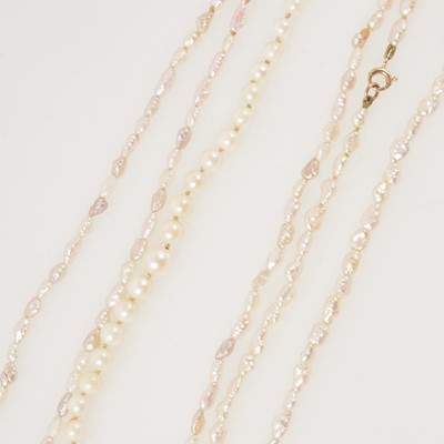 Lot 346A - A freshwater vari-hue pearl three-strand necklace, plus freshwater and simulated single strand necklaces.