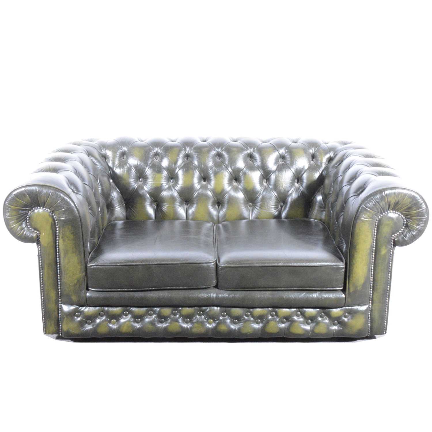 Lot 411 - A modern two-seater leather settee in the Chesterfield style