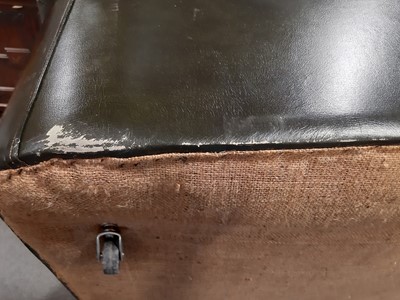Lot 411 - A modern two-seater leather settee in the Chesterfield style