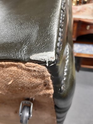 Lot 411 - A modern two-seater leather settee in the Chesterfield style
