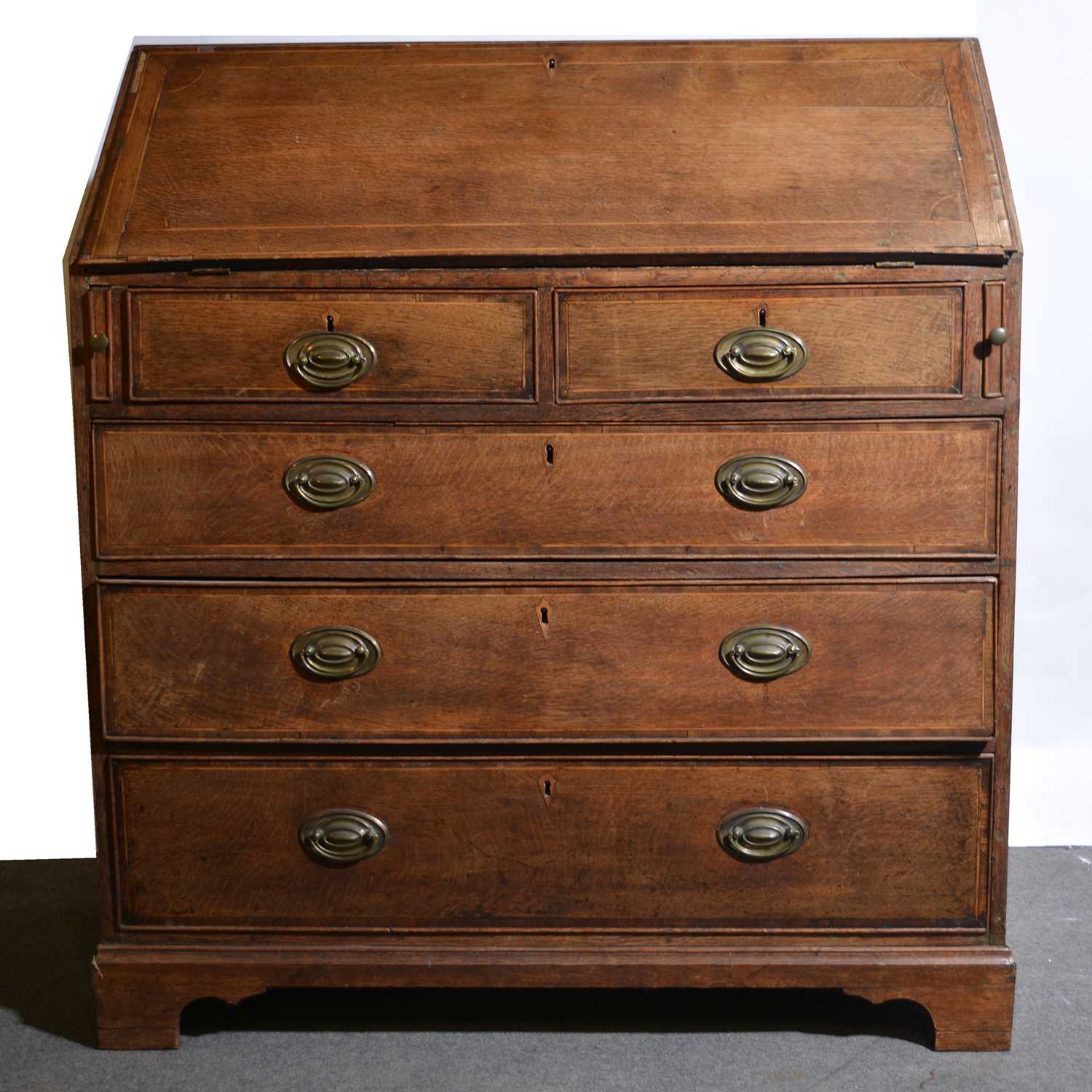 Lot 450 - George III oak bureau