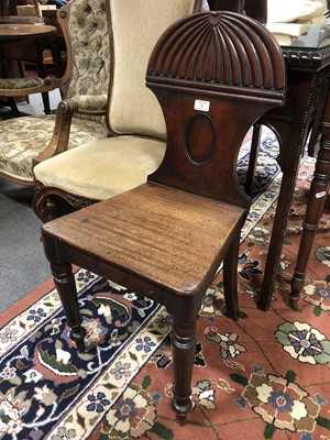 Lot 581 - A George IV mahogany hall chair, gadrooned...