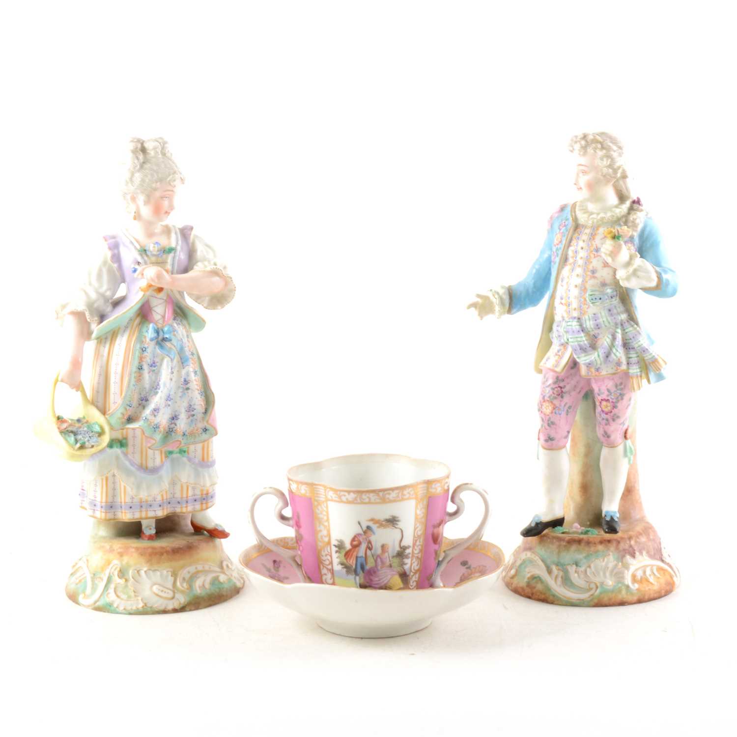 Lot 101 - A Pair of German porcelain figures, and a Dresden cup and saucer.