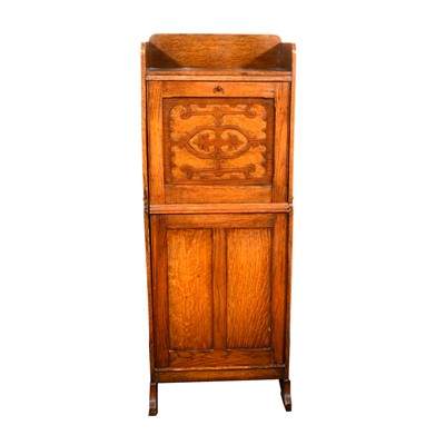 Lot 546 - A slender oak secretaire