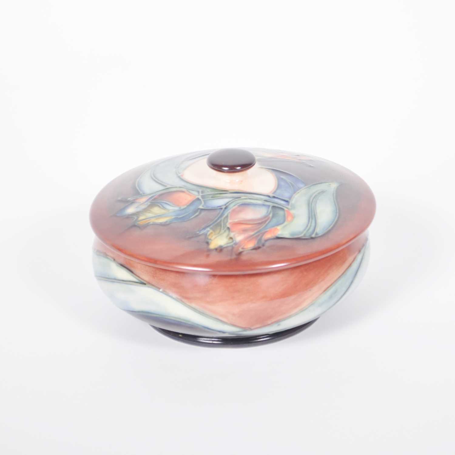 Lot 572 - A Moorcroft Pottery dish and cover, 'Red Tulip' designed by Sally Tuffin