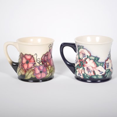Lot 21 - Two Moorcroft Pottery mugs, dated 2003 and 2005