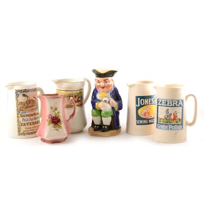 Lot 50 - A collection of pottery and bone china jugs.
