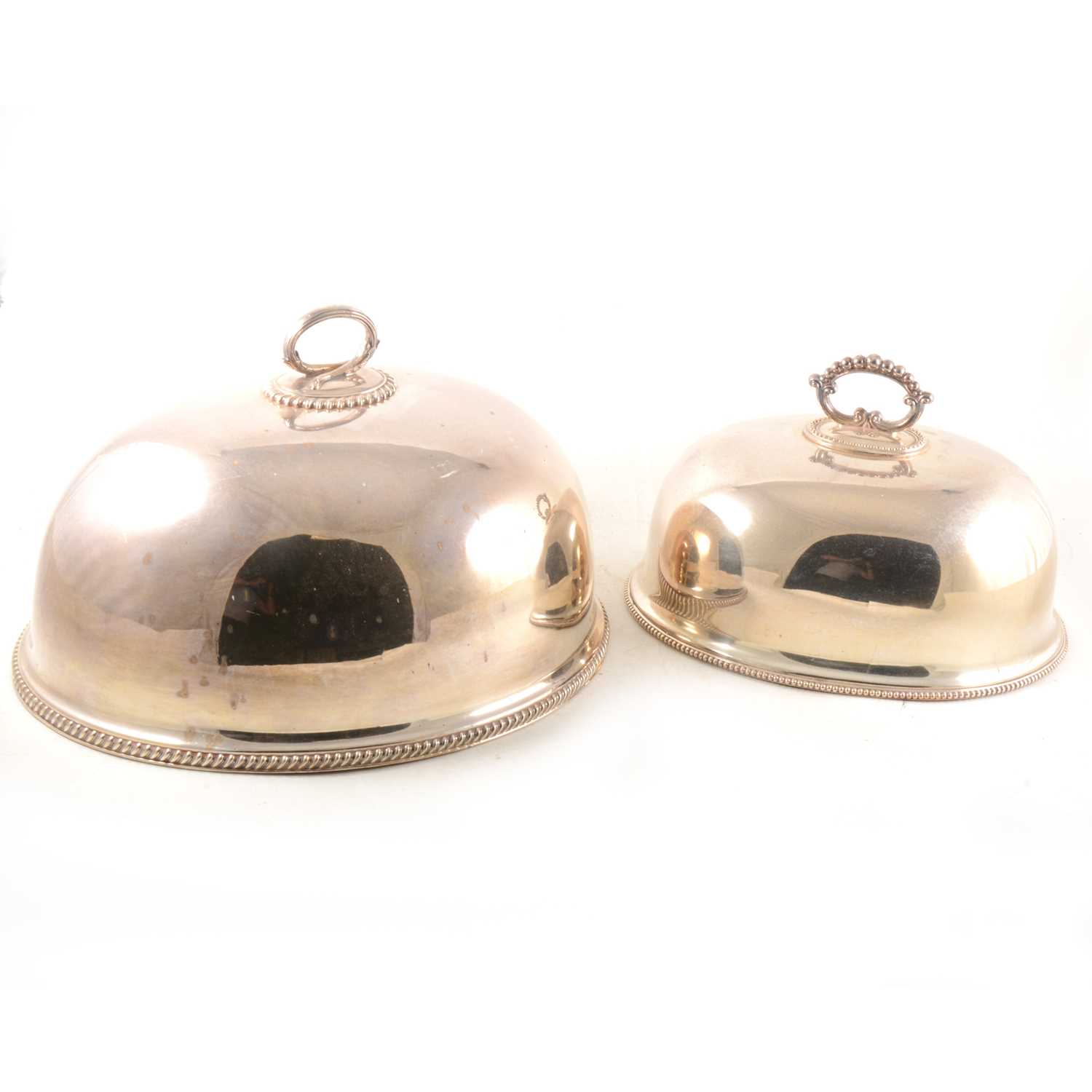 Lot 226 Two silverplated oval meat covers.
