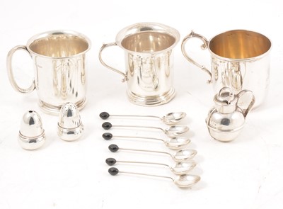 Lot 277 - Silver novelty salt and pepper, cream jug, Christening mugs