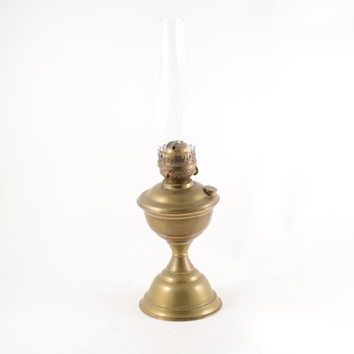 Lot 178 - A brass oil lamp